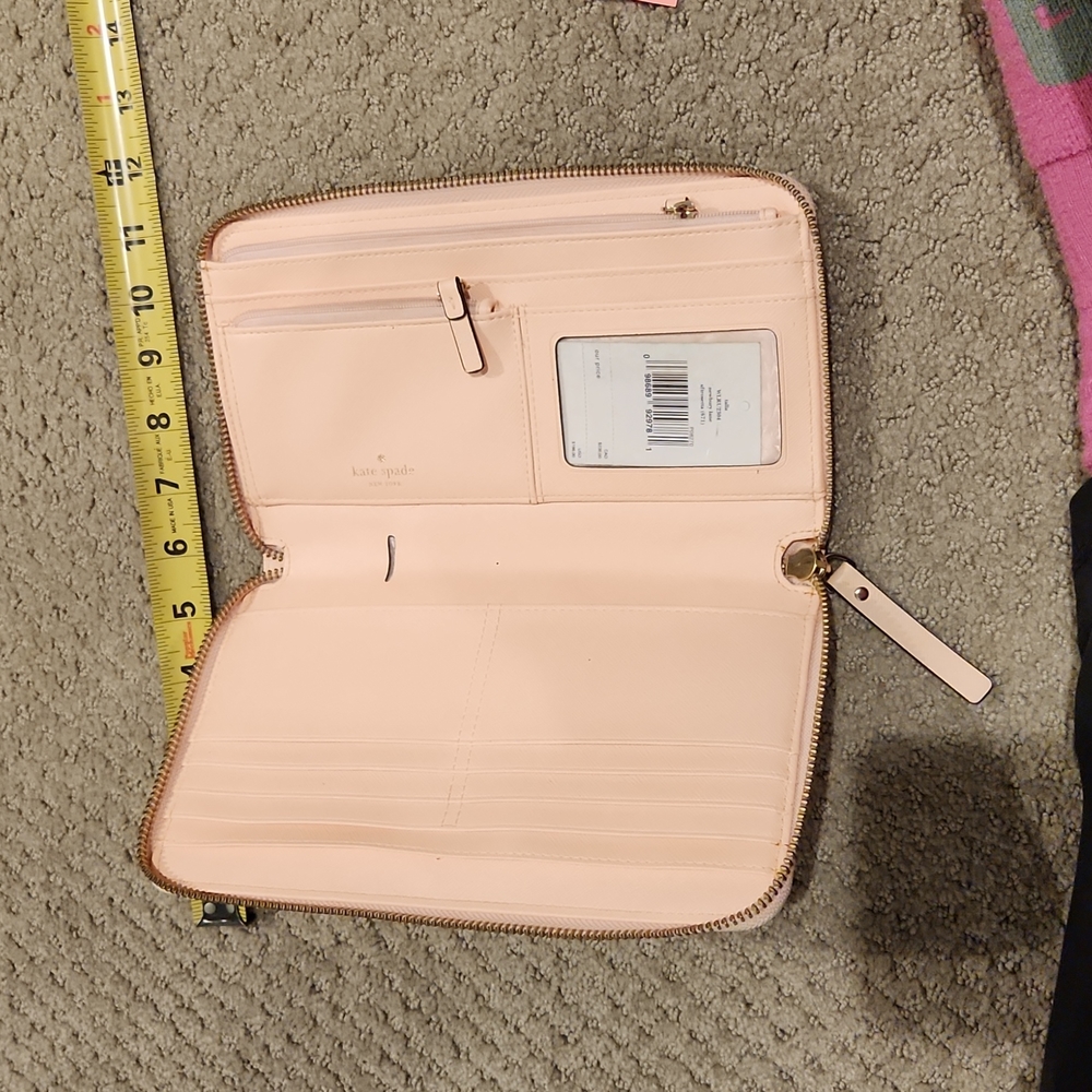 NEW $198 Kate Spade wallet. Tags inside $198 PALE PINK= SUMMER WALLET